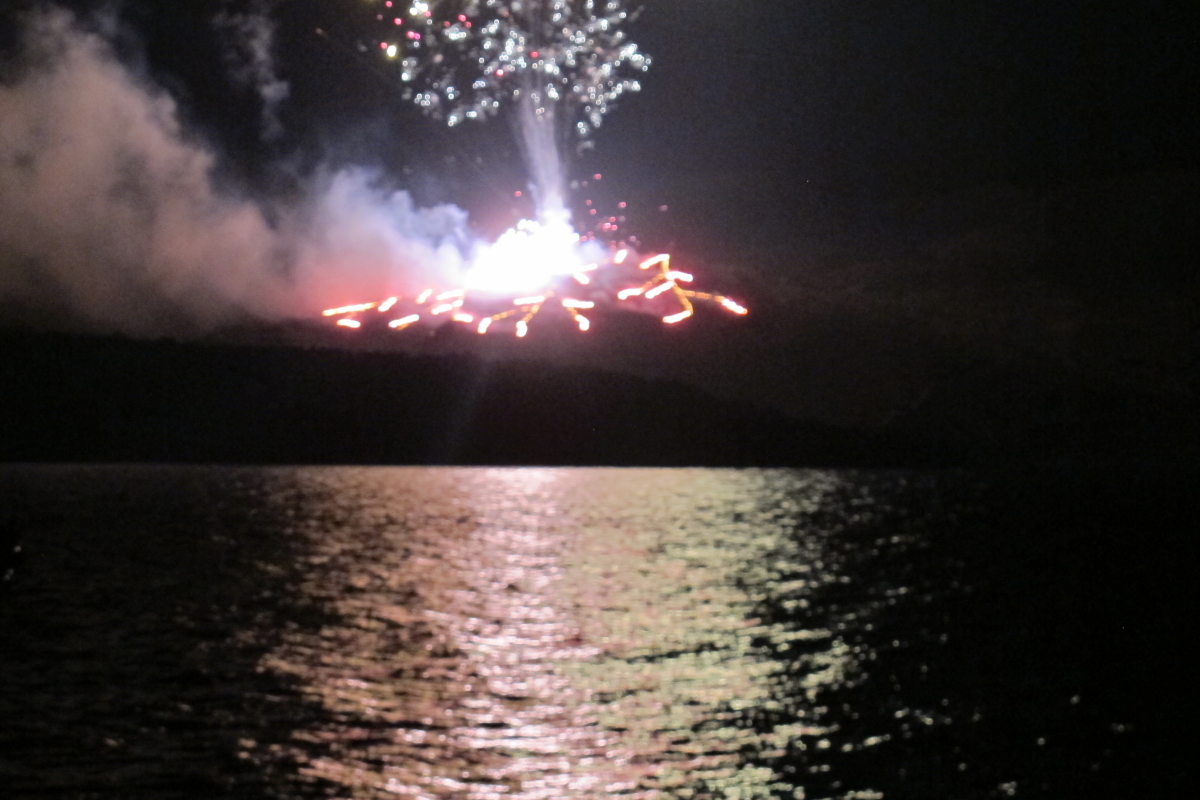 Fireworks simulating eruption of volcano Nea Kameni during the Santorini festival August 2013